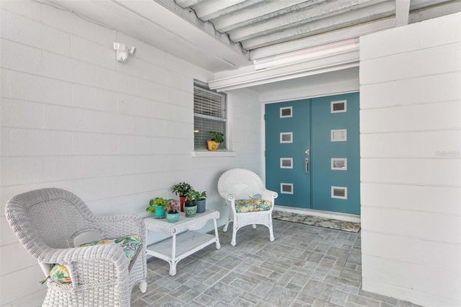 Your covered front patio and the front door. | Image 3