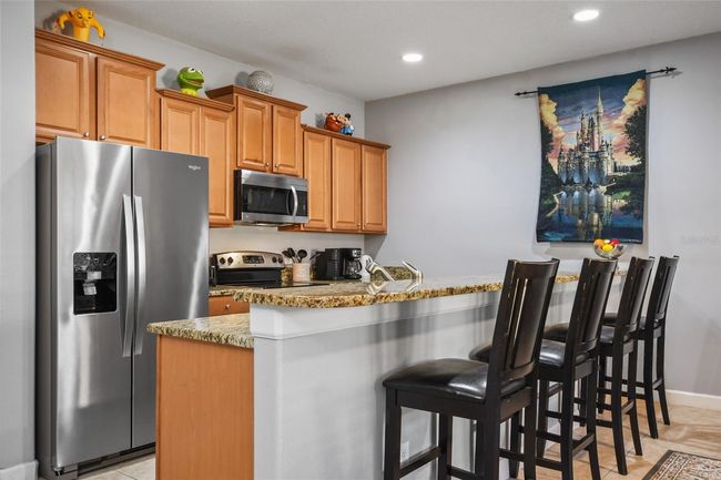8963 Coco Palm Rd, Townhouse with 4 bedrooms, 3 bathrooms and null parking in KISSIMMEE FL | Image 5