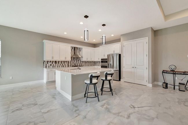 11535 Sw Surf Springs Rd, House other with 3 bedrooms, 3 bathrooms and null parking in Port St Lucie FL | Image 6