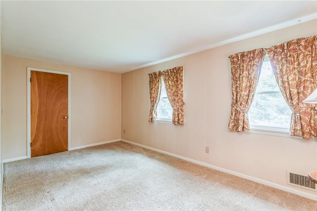 3 bedrooms upstairs in the main unit | Image 35
