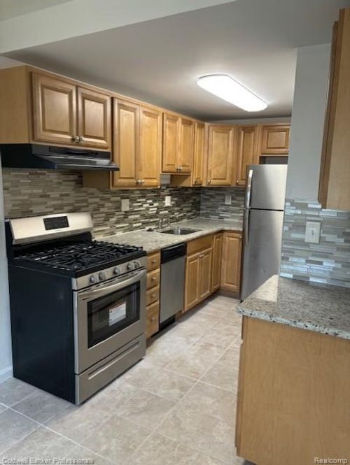 41102 N Woodbury Green Dr, Van Buren Township, MI, 48111-3028 | Card Image