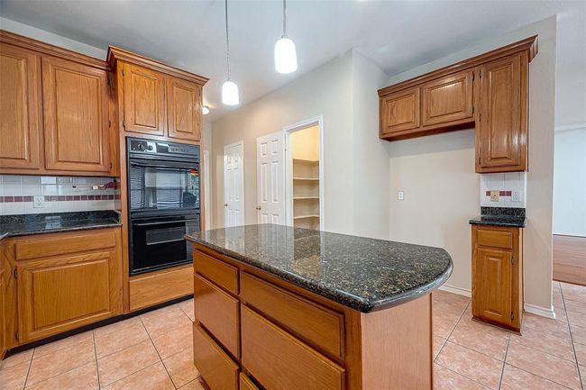 Kitchen with Island. | Image 13