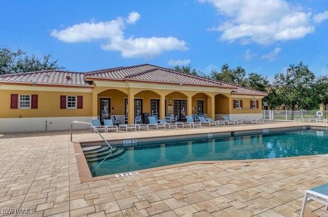 Community pool featuring a patio area | Image 32