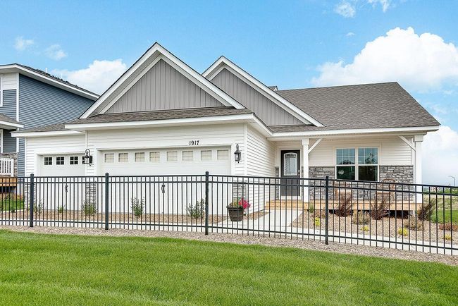 Welcome home to the Finnegan Heartland Cottage at Ravine Crossing in Cottage Grove! Photo is of model home. Options and colors may vary. Ask Sales Agent for details. | Image 40