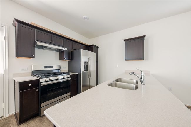 7506 Ivy Trellis Trl, House other with 4 bedrooms, 3 bathrooms and 4 parking in Del Valle TX | Image 7