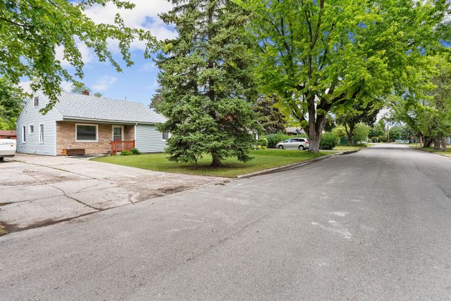 Street view of the home & front yard | Image 16