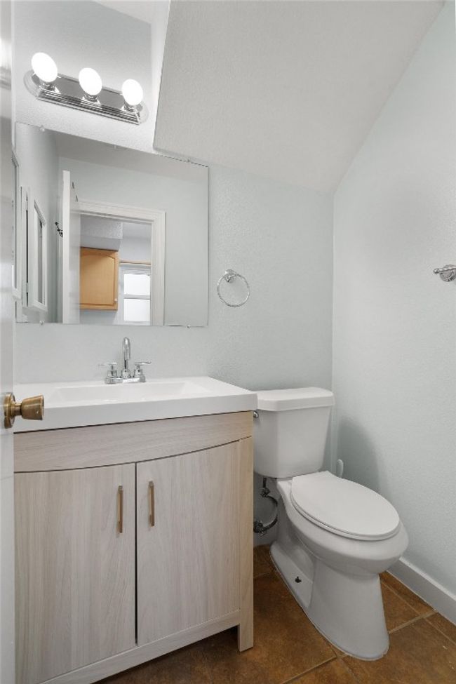 Half bath with vanity and tile patterned flooring | Image 18