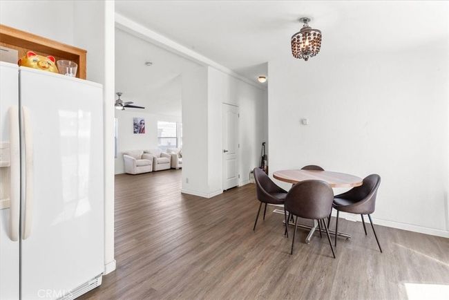 Dining room looking into Livingroom. | Image 8