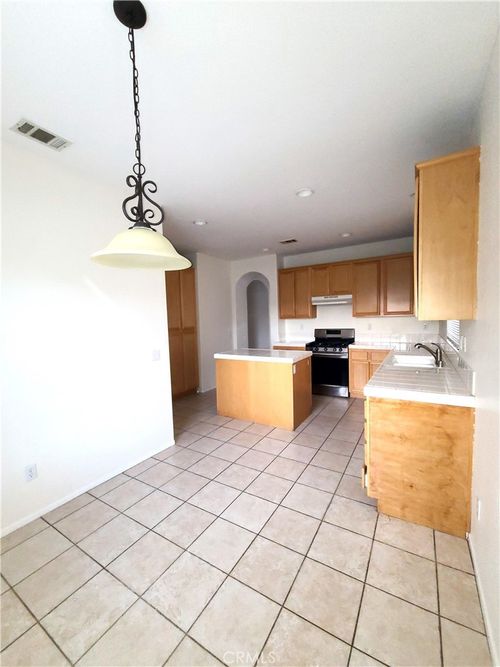 14344 Honeyhill St, Victorville, CA, 92394-7590 | Card Image