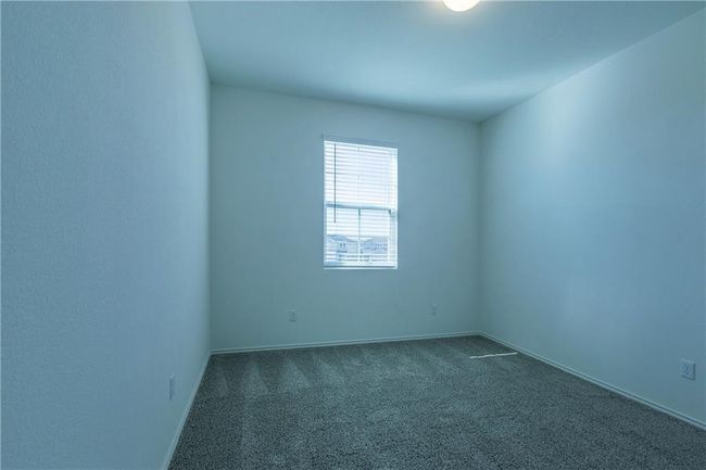 Empty room featuring dark carpet | Image 22
