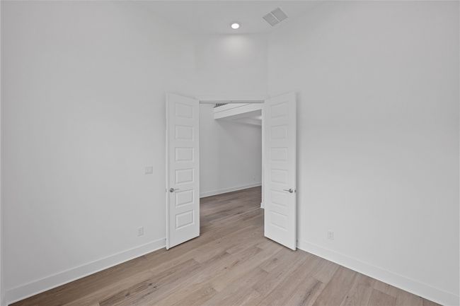 Spare room with light wood-style floors, baseboards, and recessed lighting | Image 29
