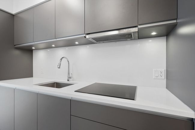 Laundry area with a sink and recessed lighting | Image 8