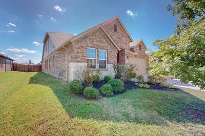 View of side of property featuring a lawn | Image 2