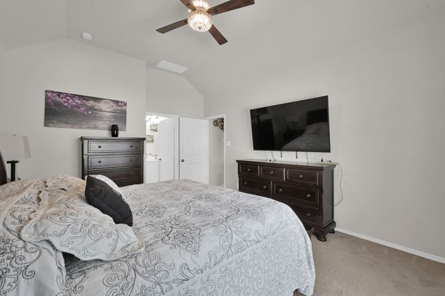 Several of the light fixtures in this home have been upgraded, including this ornate ceiling fan. | Image 16