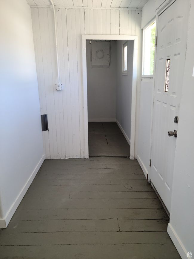 Entryway featuring wood-type flooring and baseboards | Image 9