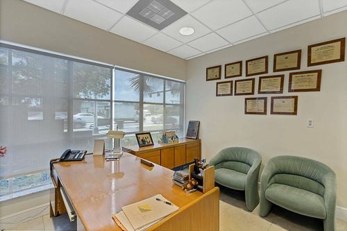 100 E Commercial Blvd, Oakland Park, FL, 33334-1687 | Card Image