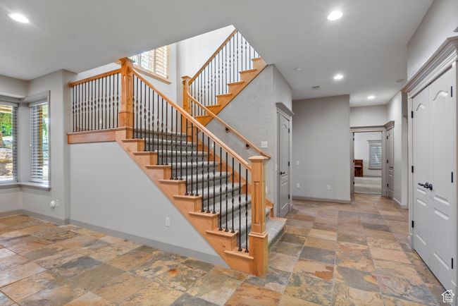 Stairway with stone tile flooring, baseboards, healthy amount of natural light, and recessed lighting | Image 45