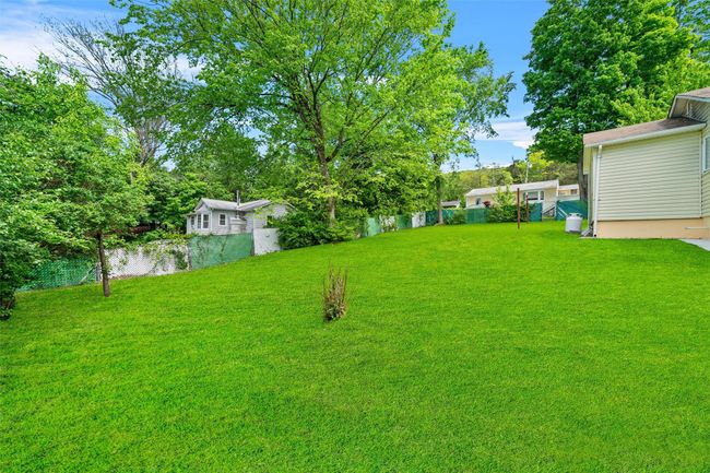 View of yard featuring a water view | Image 32