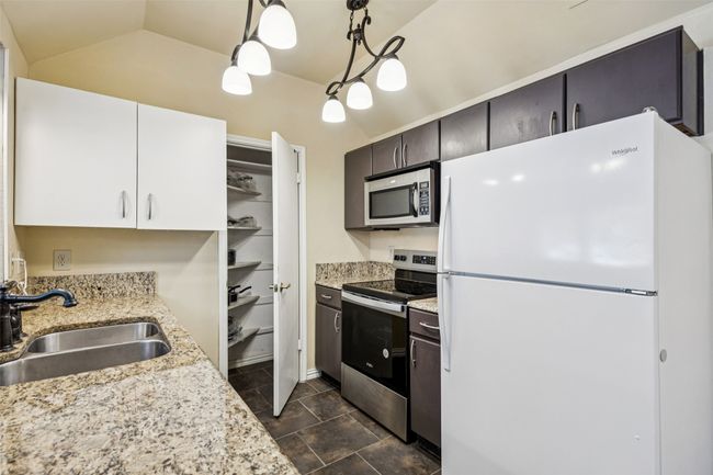 Open concept kitchen with newer appliances | Image 5