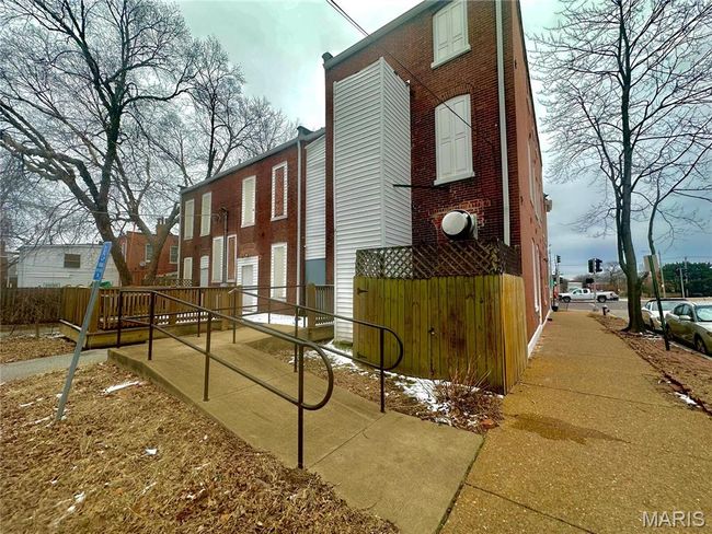 View of property exterior with brick siding | Image 5