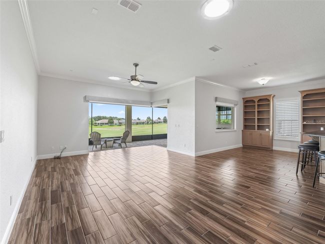 Living area w/Crown molding | Image 23