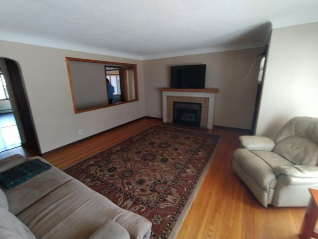 Living room with fireplace | Image 11