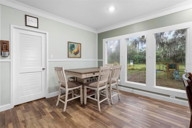 Eating space in kitchen and door access to laundry/mudroom | Image 7