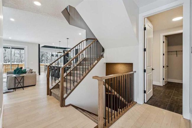 66 Aspen Summit Close Sw, Home with 6 bedrooms, 4 bathrooms and 6 parking in Calgary AB | Image 2