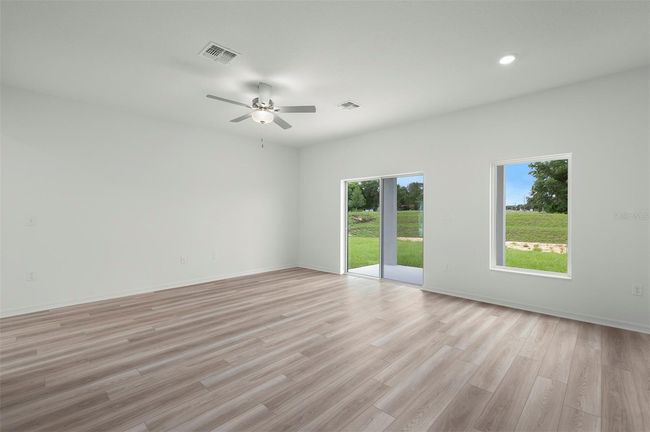 13291 Tula Loop, House other with 4 bedrooms, 3 bathrooms and null parking in ASTATULA FL | Image 4
