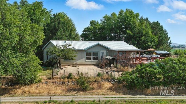 View of front of home featuring a metal roof | Image 47