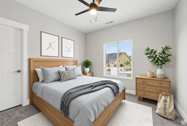 Bedroom featuring carpet, baseboards, and a ceiling fan | Image 42