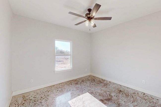 Empty room featuring baseboards and ceiling fan | Image 32