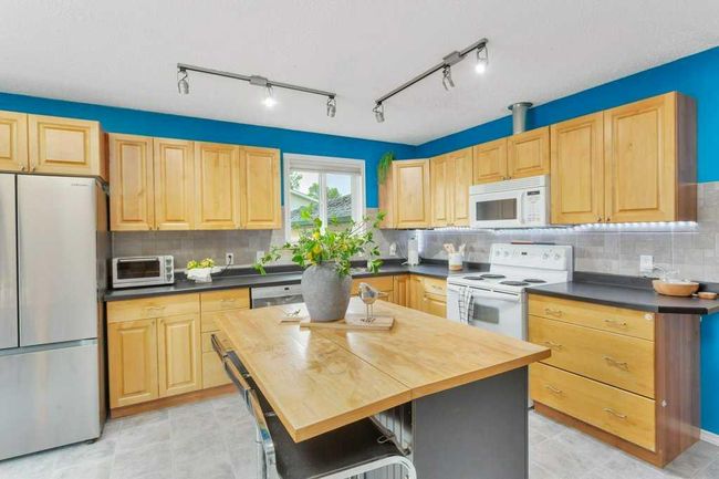 5620 50 Street, House other with 4 bedrooms, 2 bathrooms and 4 parking in Rimbey AB | Image 12