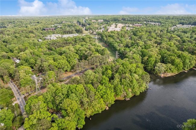 Bird's eye view featuring a wooded view and a water view | Image 42