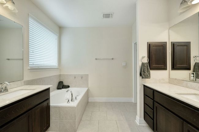 Primary bathroom with a garden tub | Image 14