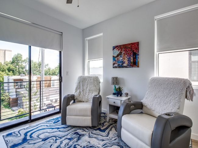 Living area featuring ceiling fan | Image 17