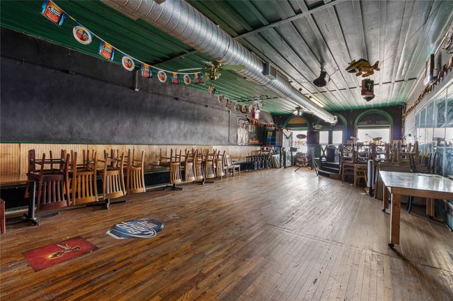 Misc room with hardwood / wood-style floors | Image 9