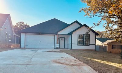 View of front of property featuring a garage | Image 2