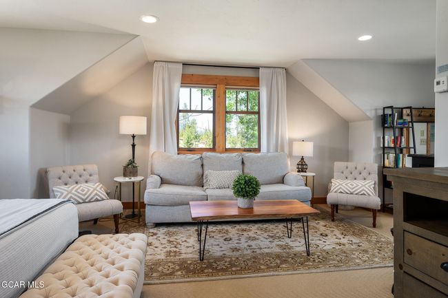 4th bedroom/studio (non conforming) space above garage. | Image 26