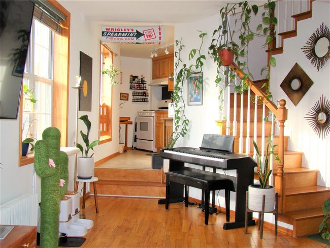 Miscellaneous room with radiator and light hardwood / wood-style floors | Image 16