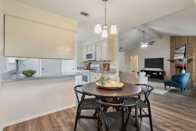 Dining room with view of living. | Image 8