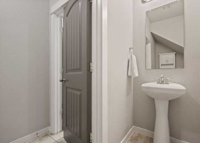 Powder bath off the living space | Image 18