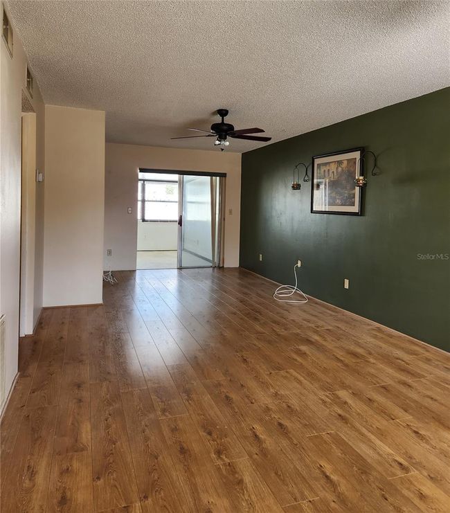 Large, Bright living space, View of Florida Room from Front Door | Image 4