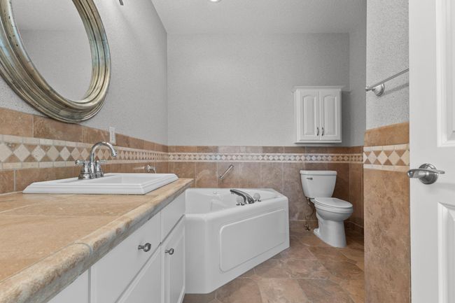Primary bath with jetted tub. | Image 11