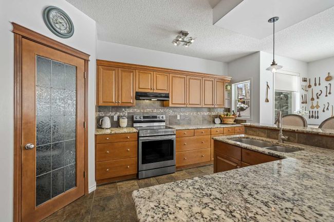 110 Tuscany Ridge Close Nw, Home with 4 bedrooms, 3 bathrooms and 2 parking in Calgary AB | Image 3
