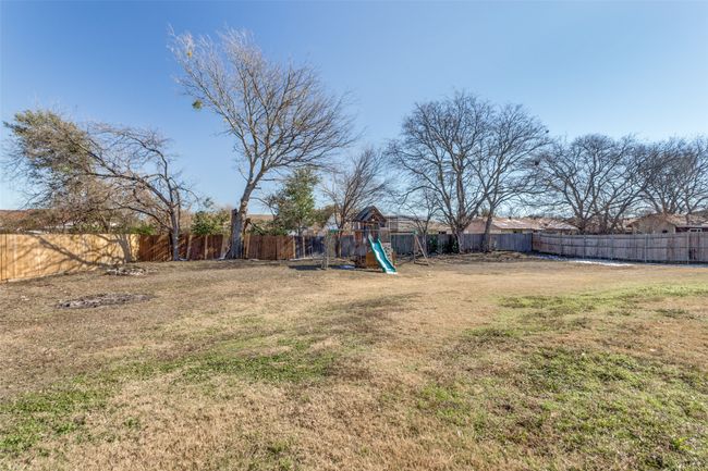 View of yard featuring a playground | Image 16