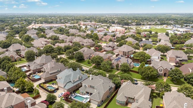 Aerial view of residential area featuring a pool | Image 37