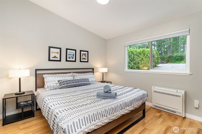 Main floor KING SIZED bedroom with large closet, black-out blinds and TRIPLE pane window | Image 26