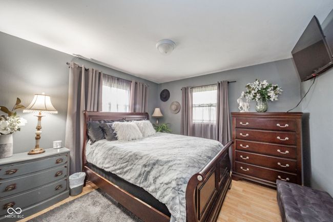 bedroom featuring light wood-style flooring | Image 12