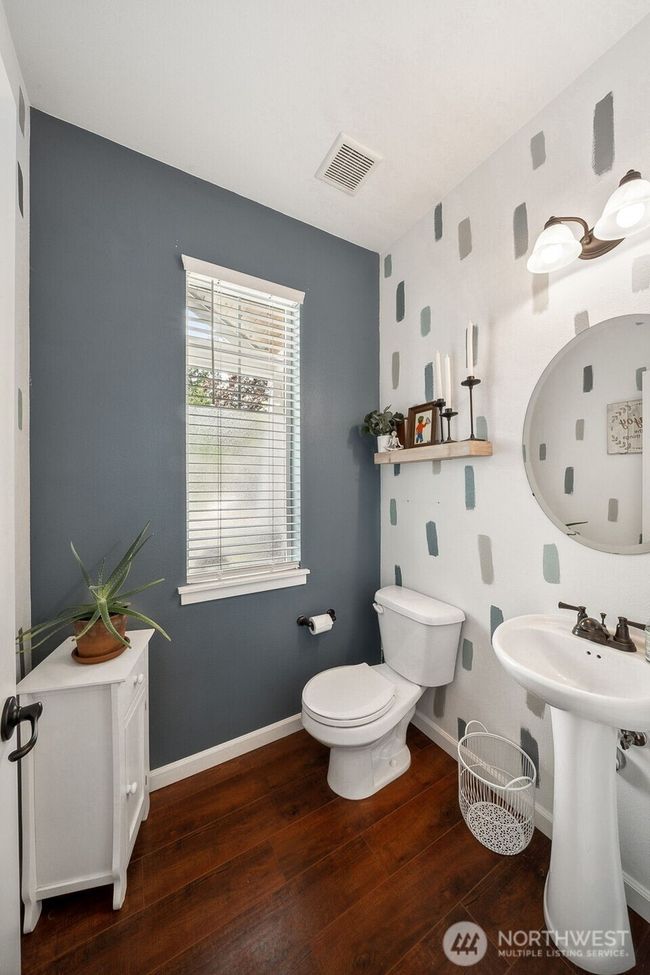 1/2 bathroom located just off the foyer on main level. | Image 4